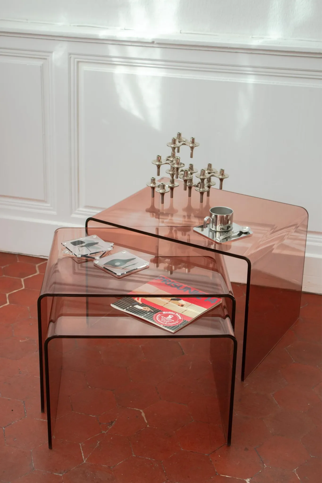 Vintage trio of nesting tables in smoked plexiglass by Michel Dumas, year