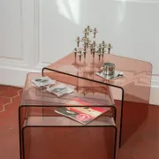 Vintage trio of nesting tables in smoked plexiglass by Michel Dumas, year