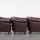 Set of three classic English-style Chesterfield cowhide  club armchairs