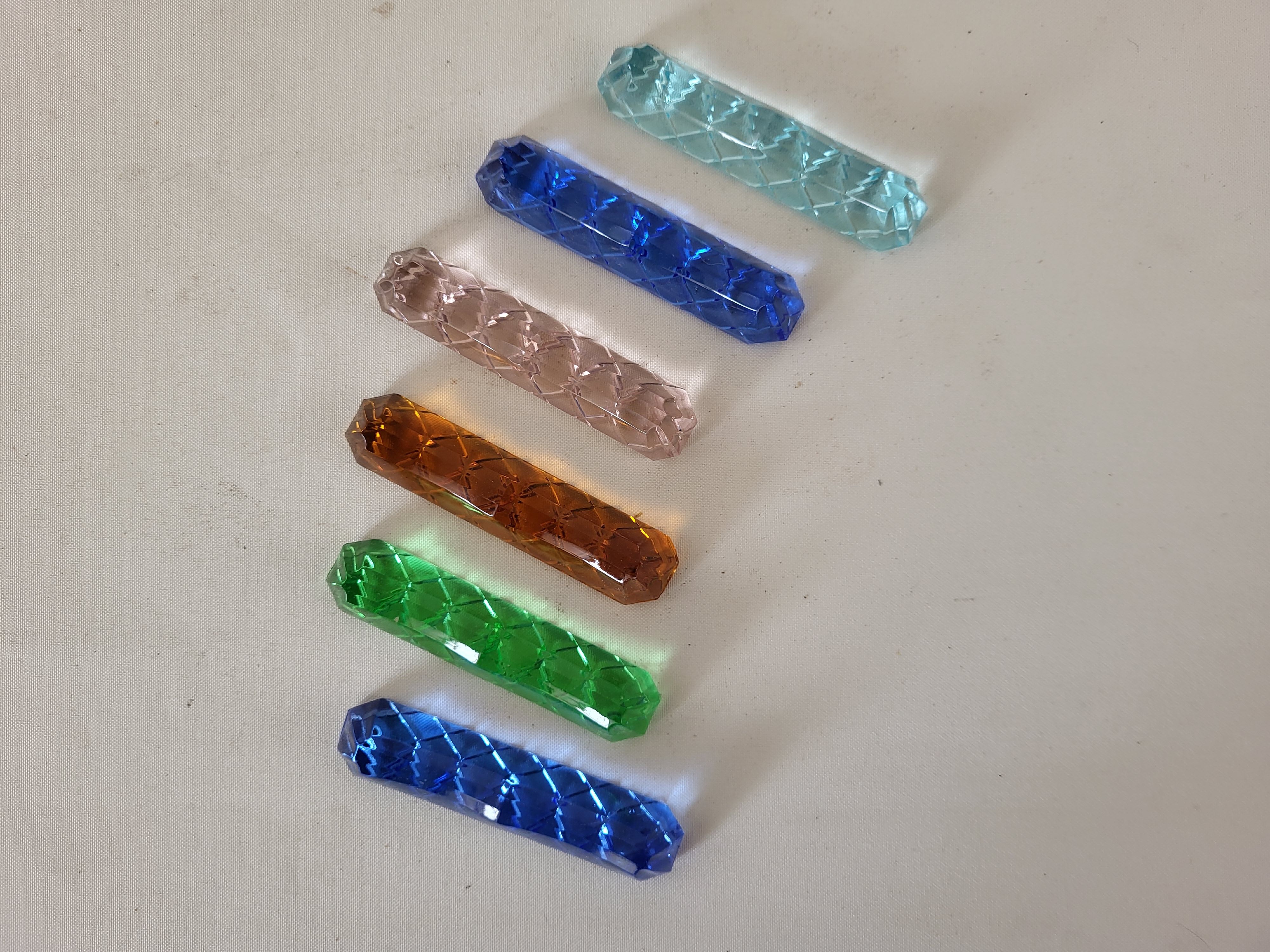 6 glass knife holders of colors