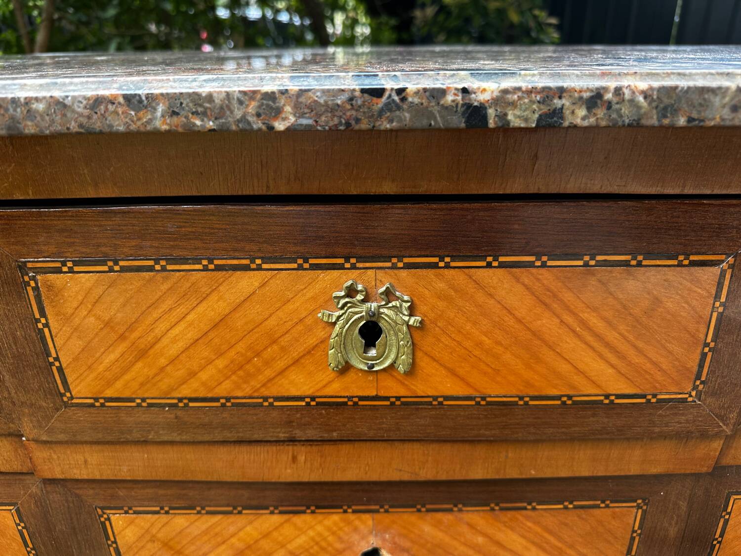 Transitional Louis XV - Louis XVI commode from the 19th century.