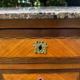 Transitional Louis XV - Louis XVI commode from the 19th century.