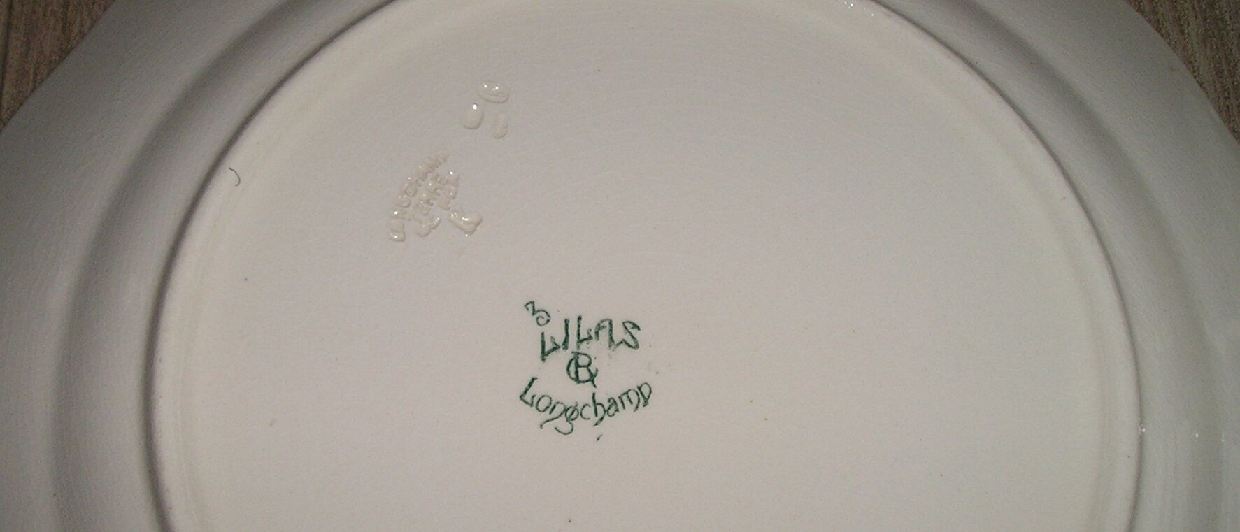 Longchamp's fee-making table service, 18-piece Lilas 1900 model