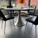 Round black top table with metal legs KARE design