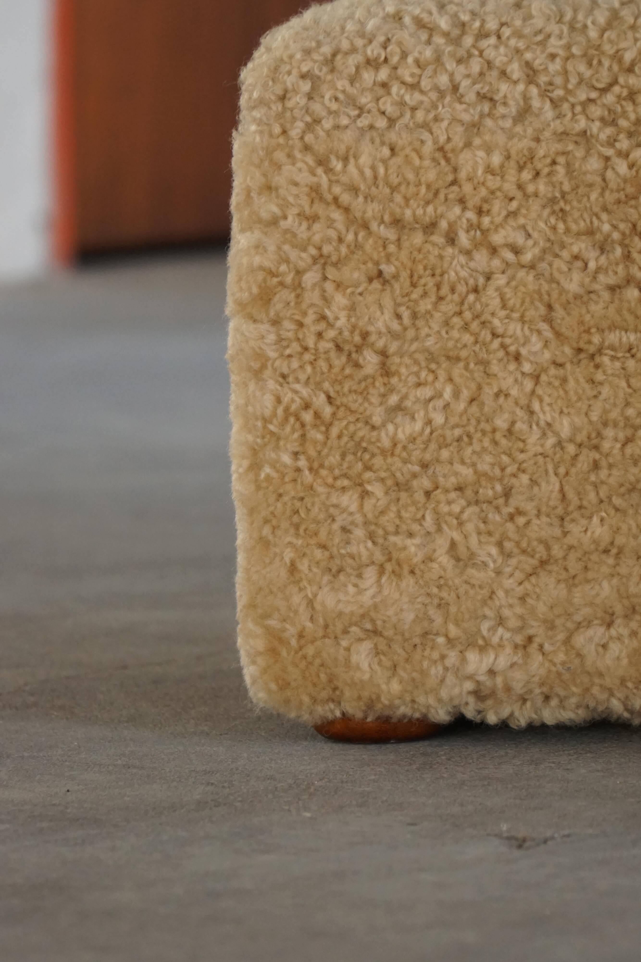 French mid-century cube poufs, a pair of lambswool stools, 1960s.