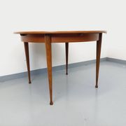 Round dining table in vintage Scandinavian style from the 50s and 60s in teak.