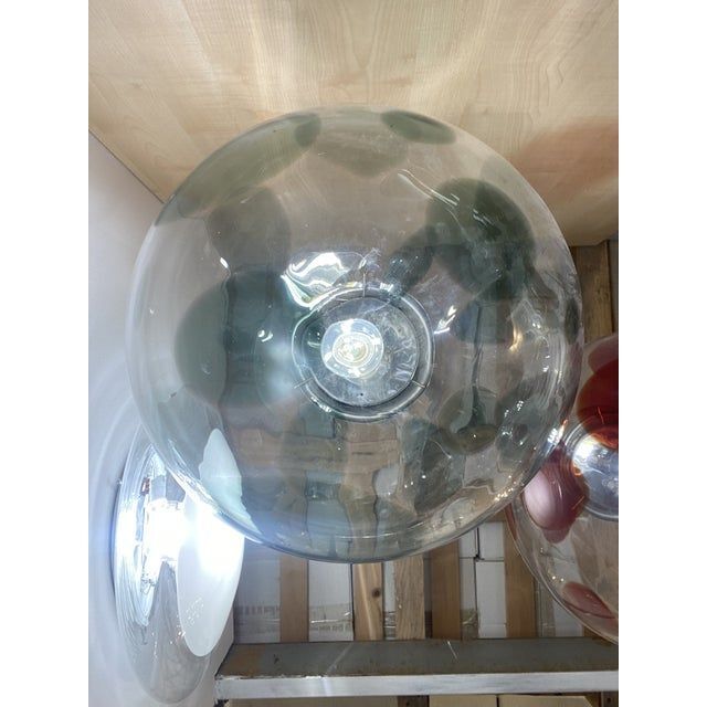 1990s contemporary olive-green and transparent sphere in murano glass