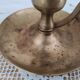 Hand candle holder called cellar rat in solid brass