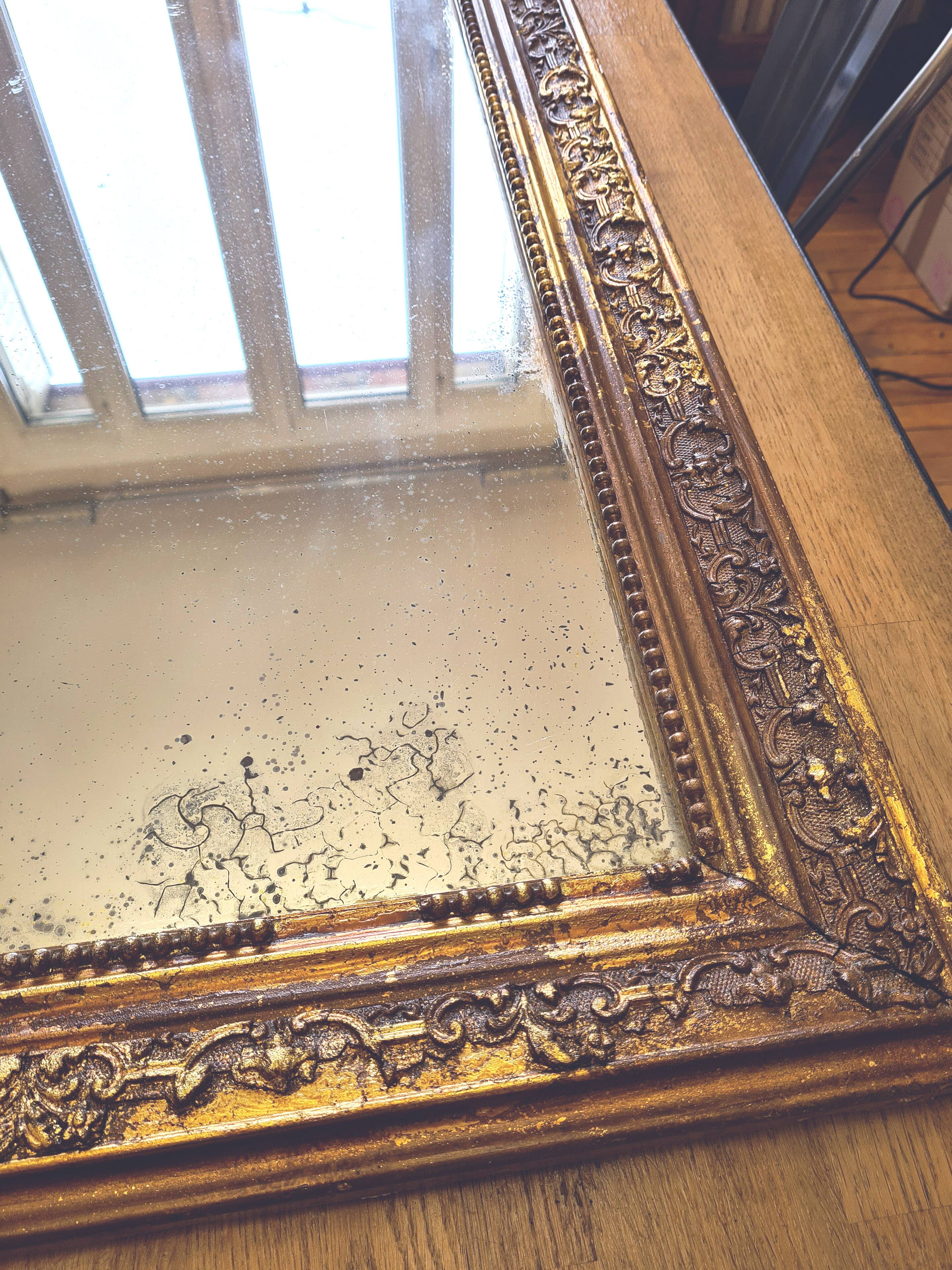 Old Louis Phillipe mercury mirror, in gilded stucco.
