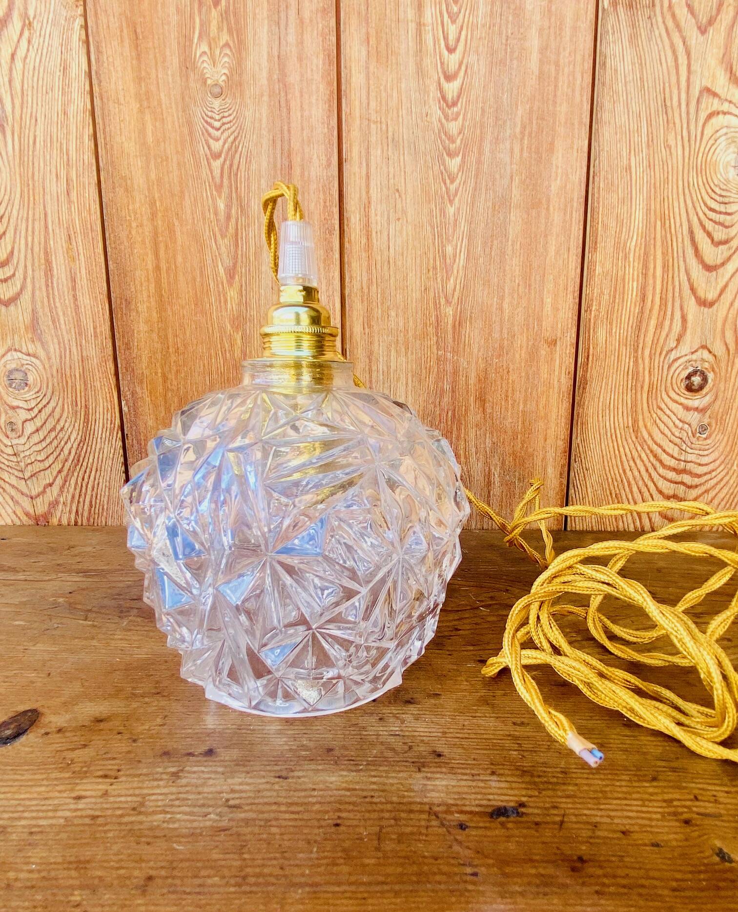 Globe pendant light in chiseled glass