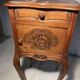Pair of antique bedside tables with marble top and ceramic niche