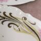 Set of 5 Limoges porcelain dessert plates in Art Nouveau style.