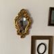 Golden mirror in baroque style.