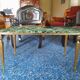 Coffee table in gilded bronze and green Alpine marble