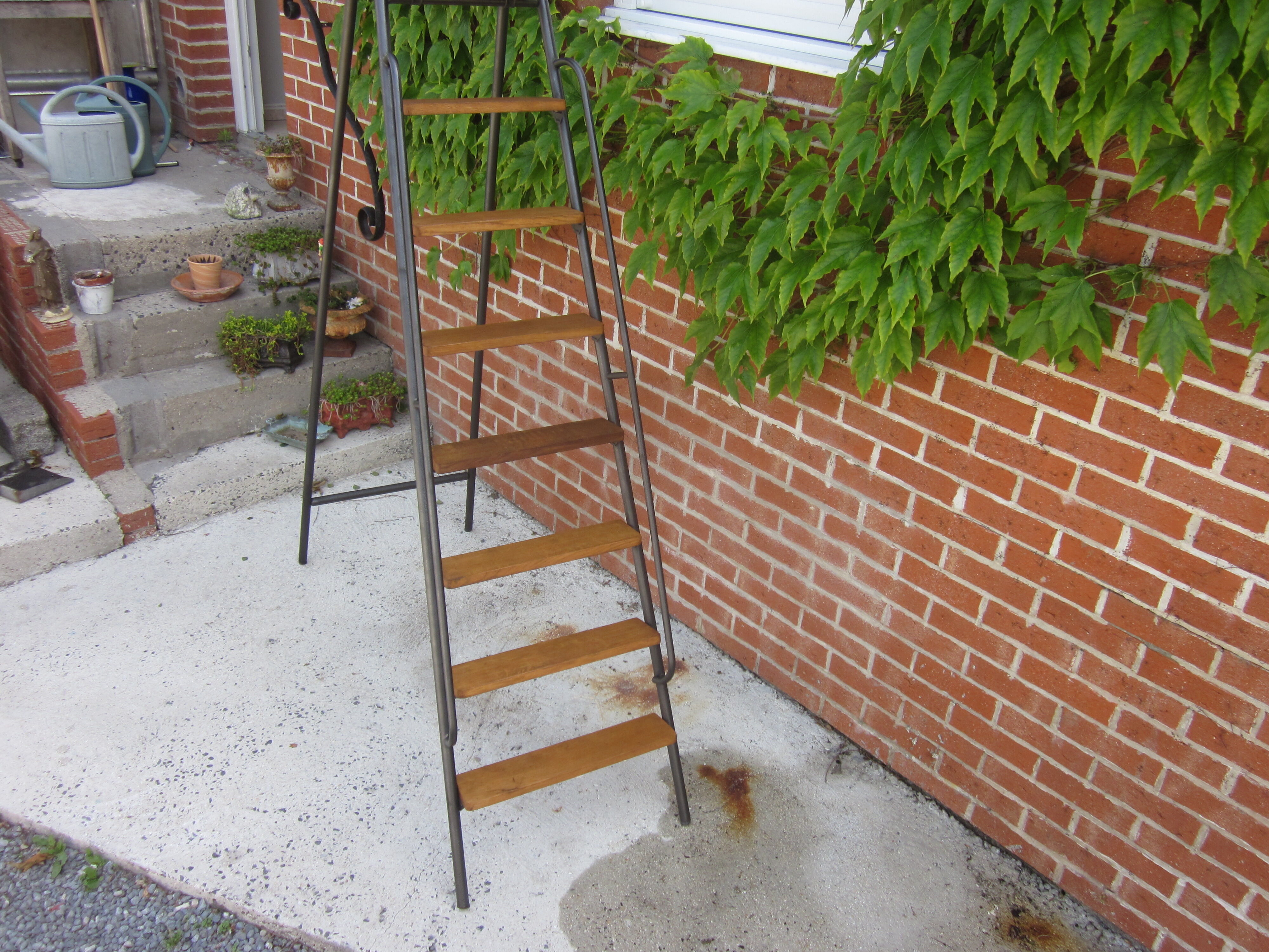 Old stepladder in metal and wood
