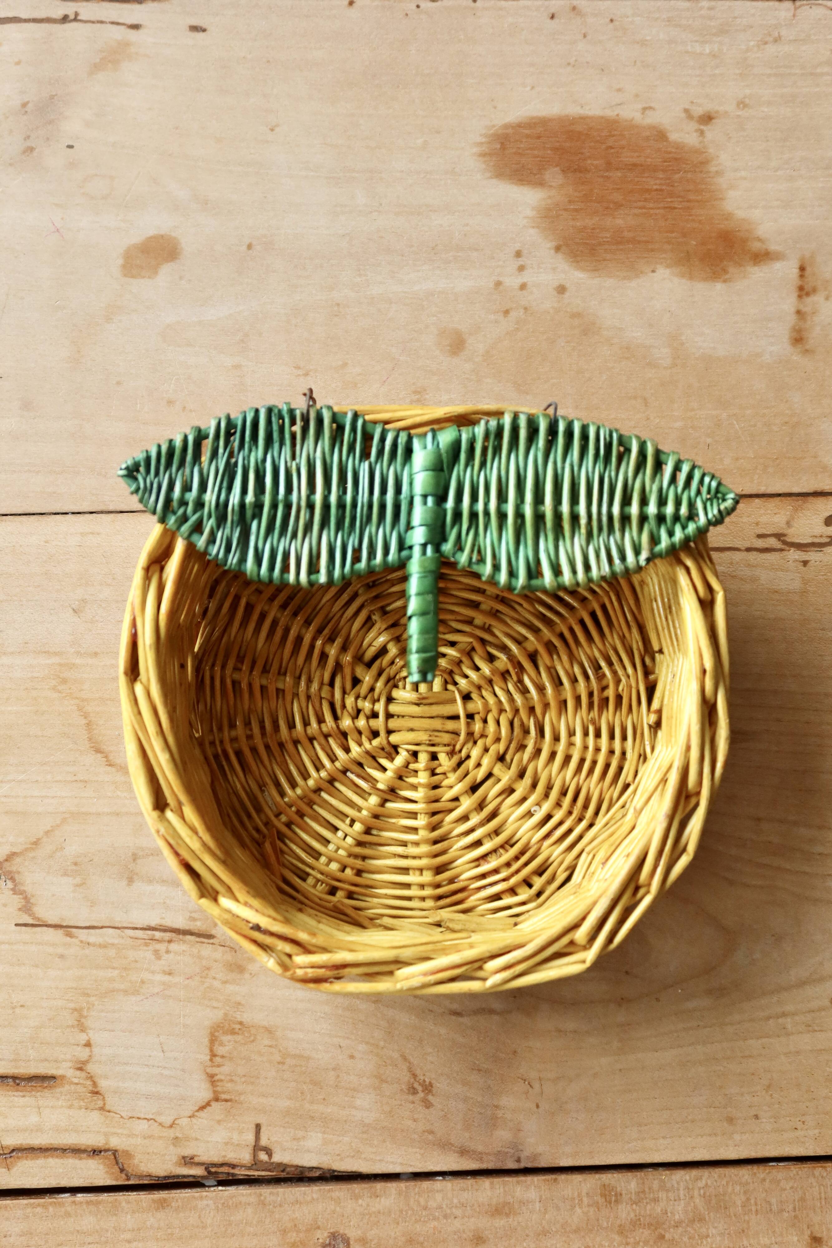 Small vintage wicker baskets in the shape of orange and lemon fruit