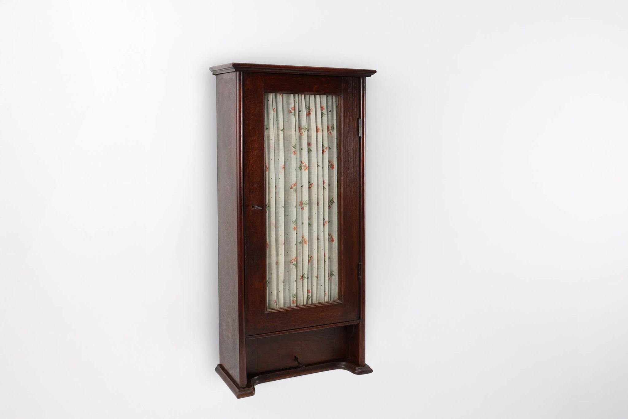 French Art Deco tall cabinet with glass door and hidden compartiment, ca. 1