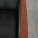 Electrically adjustable Art Deco design recliner with black cowhide leather