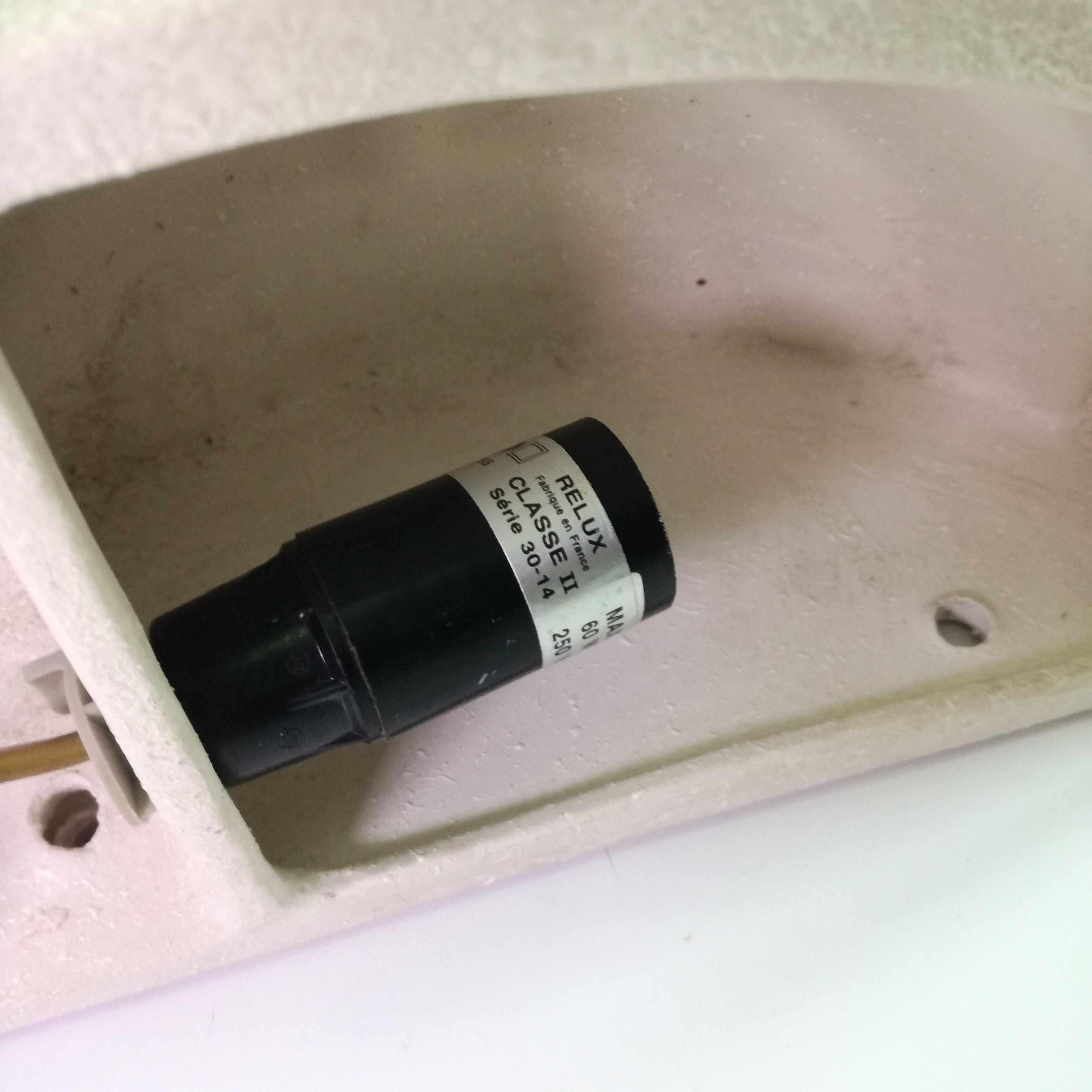 Wall sconces in stone and in the shape of a basin