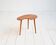 Biomorphic teak and brass side table from the 1950s–1960s