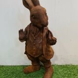 Rabbit with a cast iron pipe garden statue