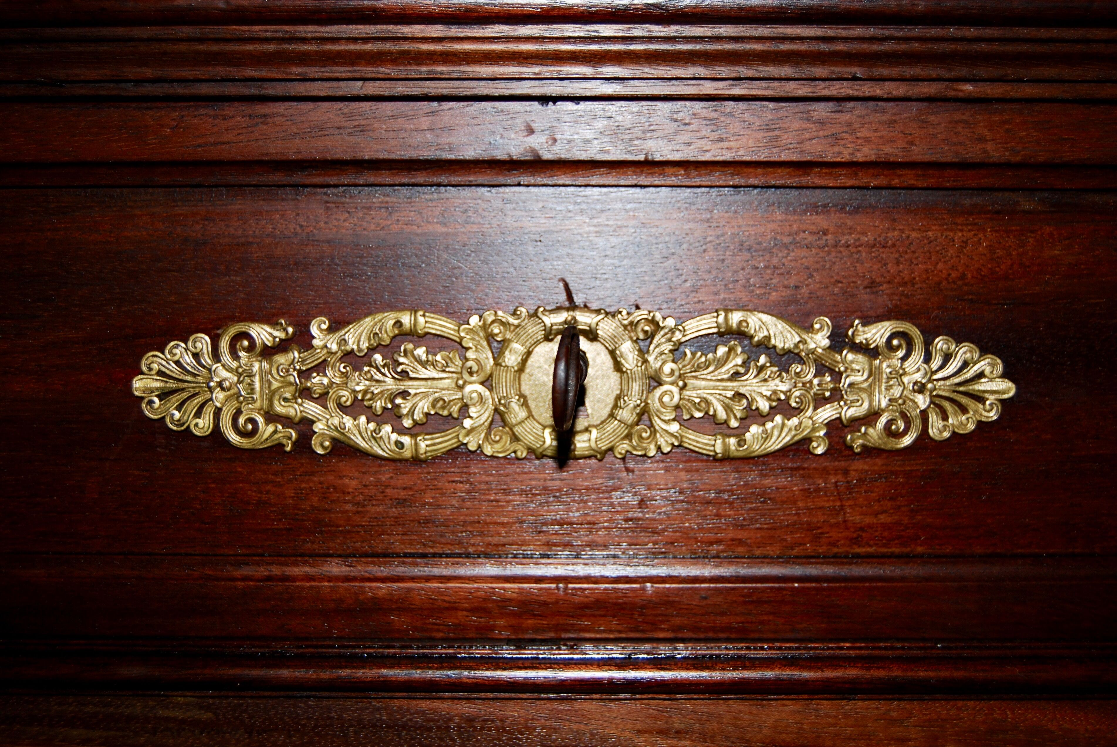 Large Empire library in solid mahogany, late nineteenth century