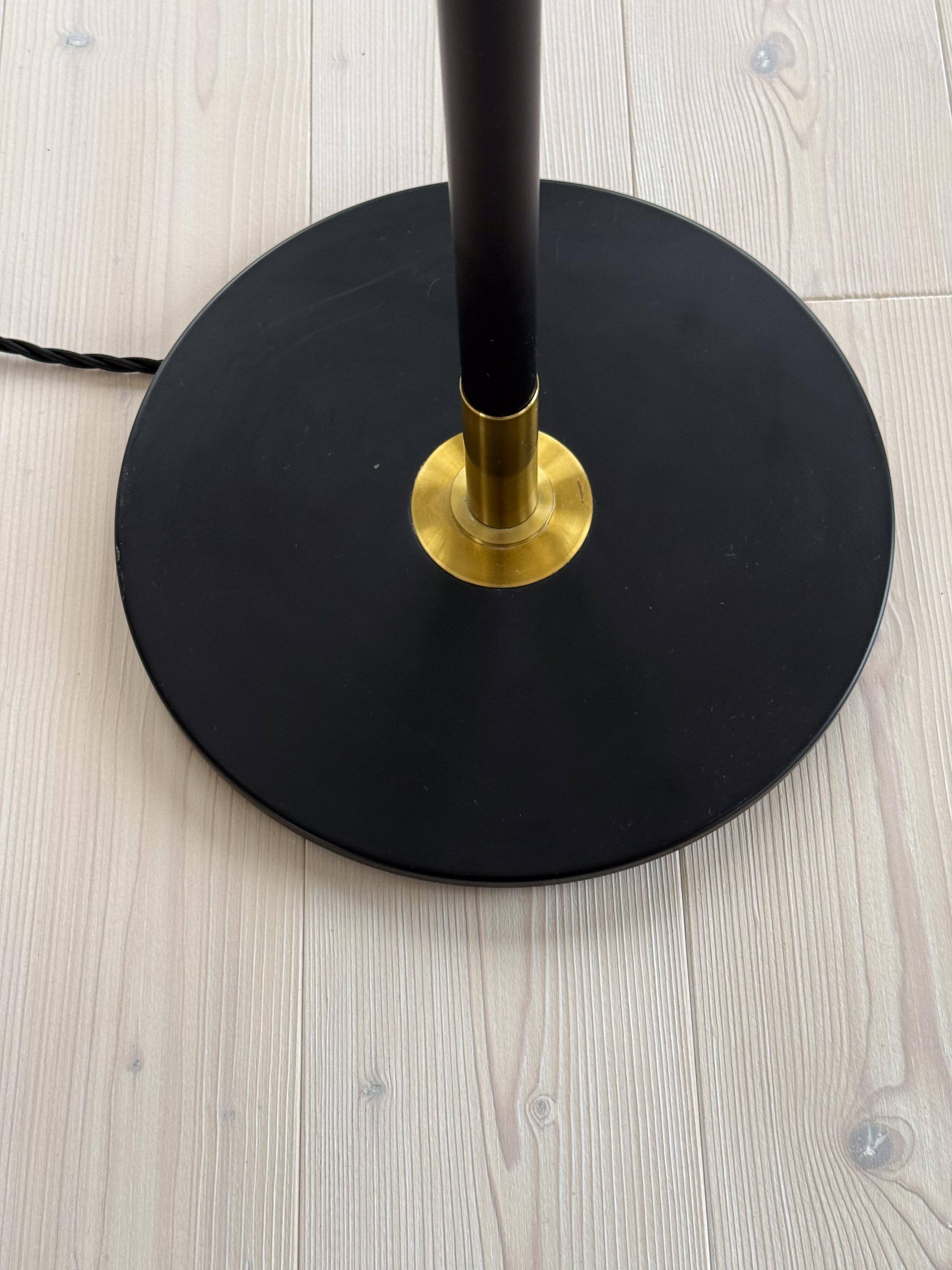 Modern mid-century floor lamp by Aage Petersen, for Le Klint, Denmark, 1970s.