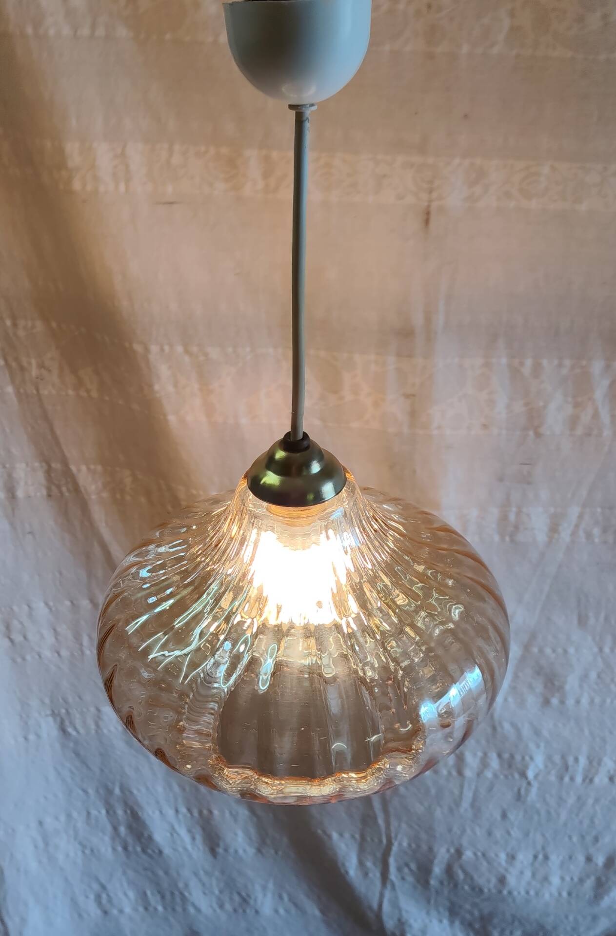 70's amber glass suspension design