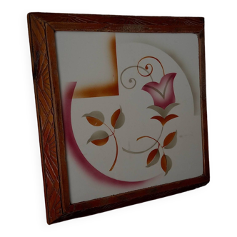 Vintage square trivet. Old ceramic tile trivet and Art Deco carved wooden tower.