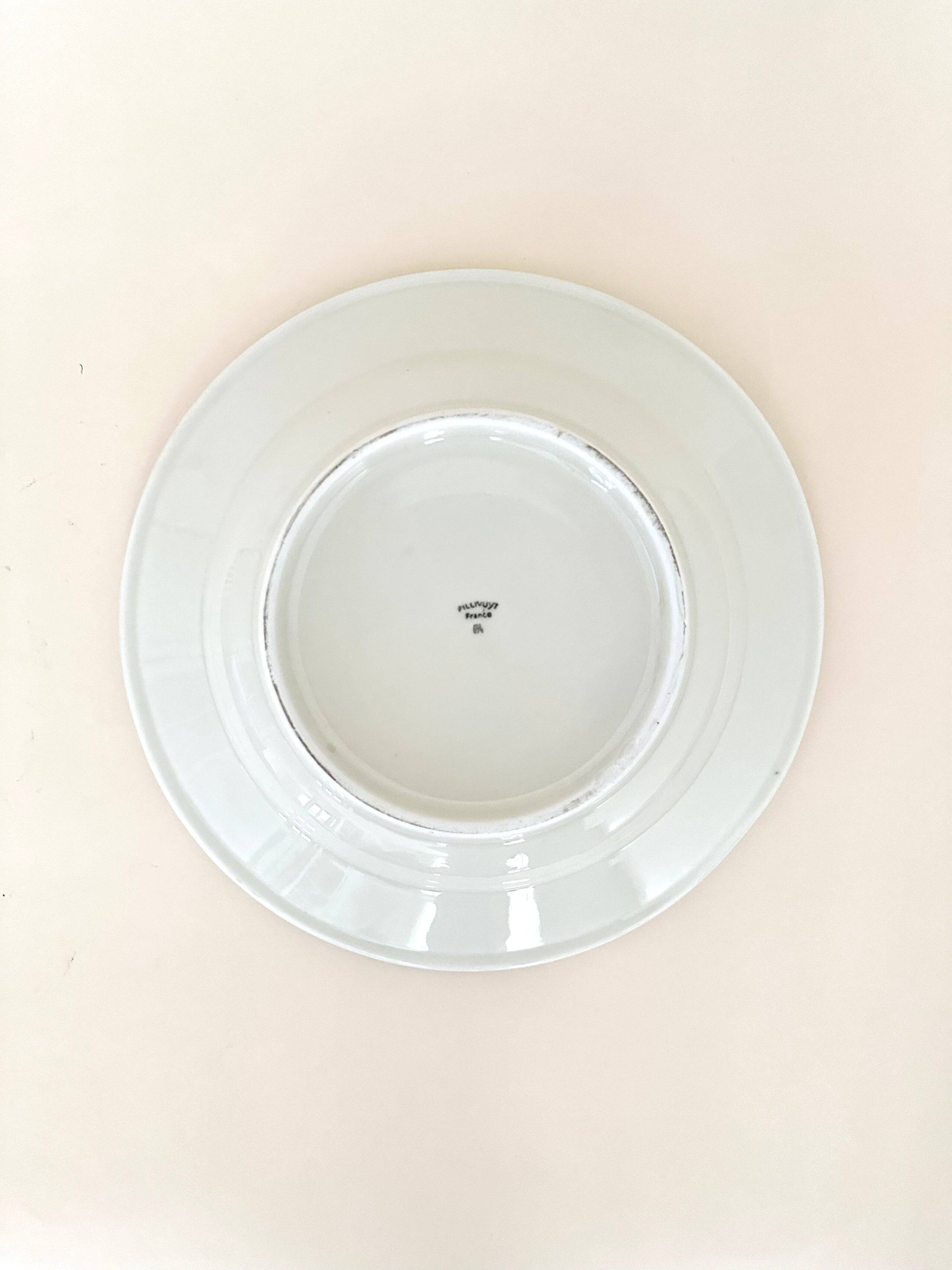 Set of six white porcelain deep plates by Pillivuyt.