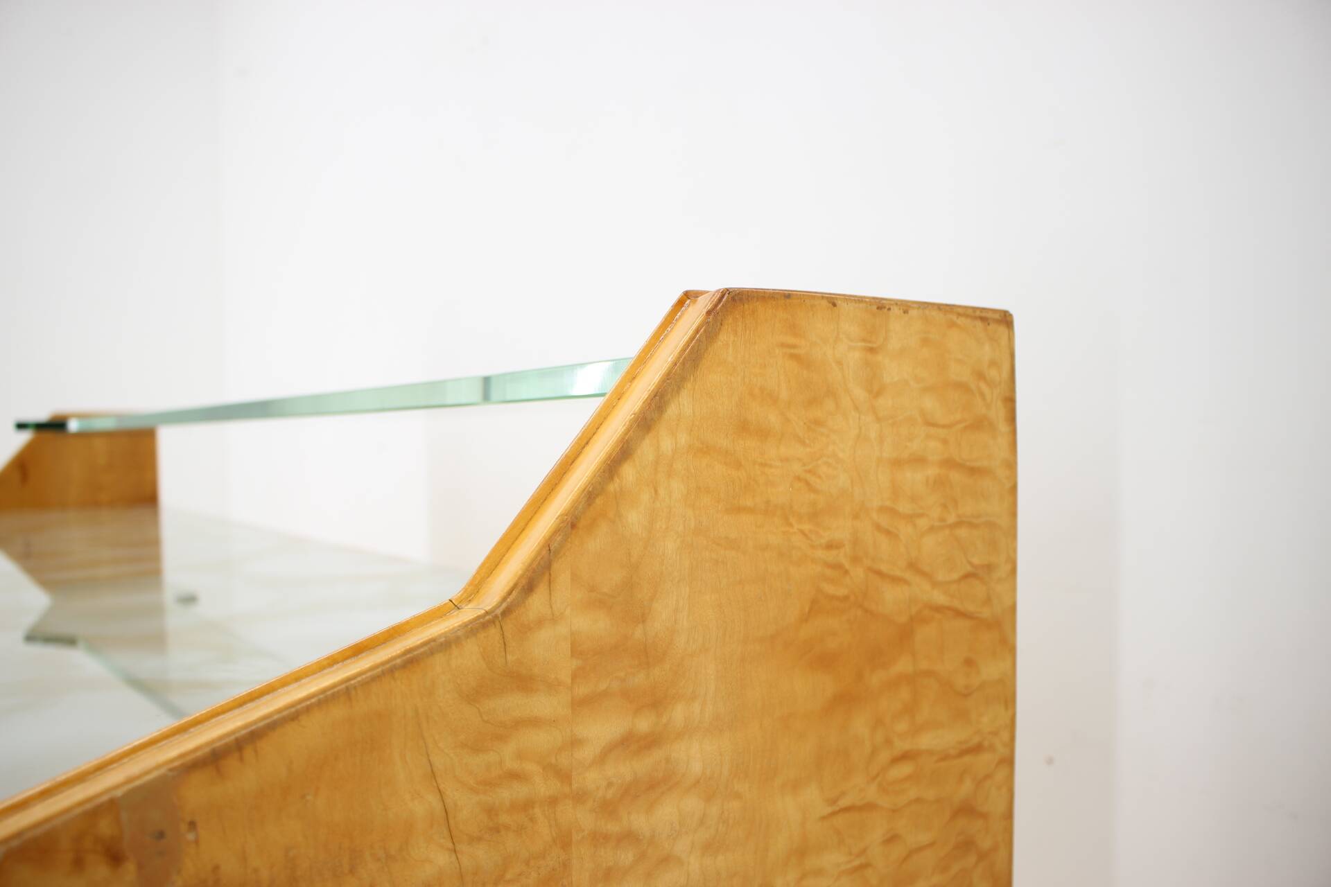 1960s italian sideboard/chest of drawers in high gloss finish with glass top and shelf