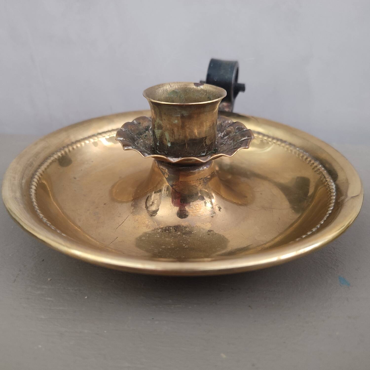 Brass cellar candle holder