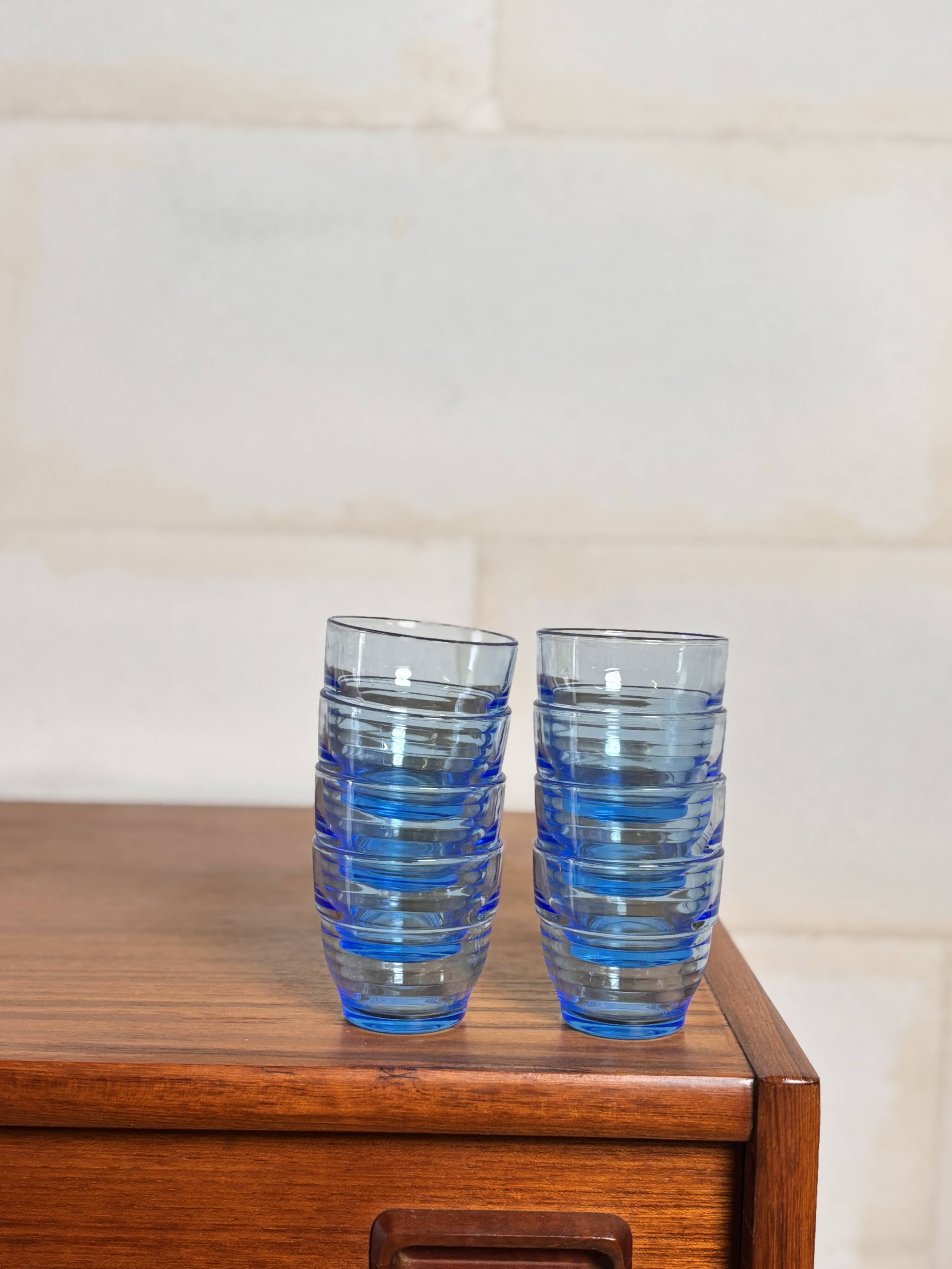 Set of 8 blue Arco France glasses.