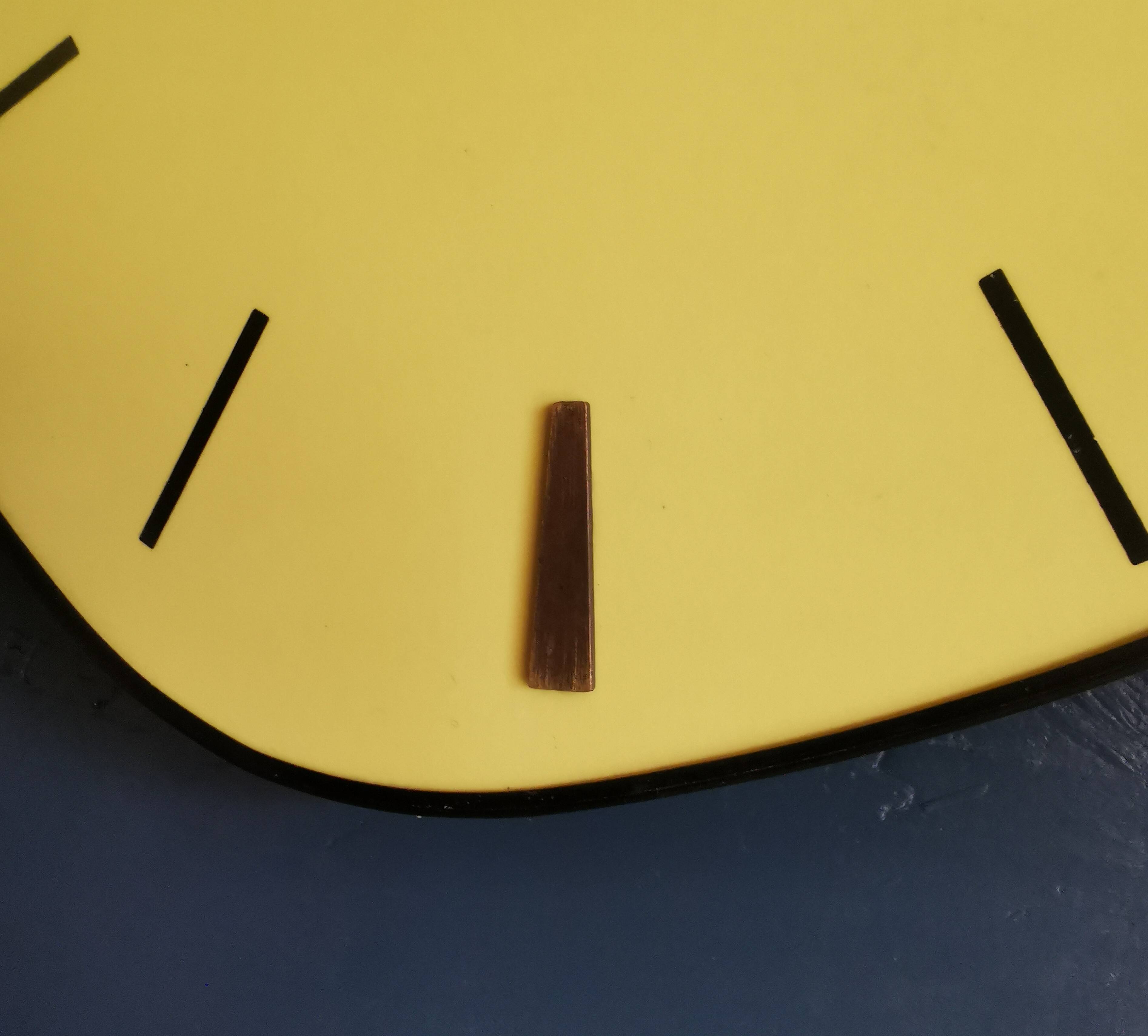 Vintage Formica clock silent asymmetrical wall pendulum "Yellow Japy"