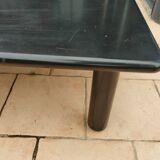 Old vintage wooden coffee table with tubular base