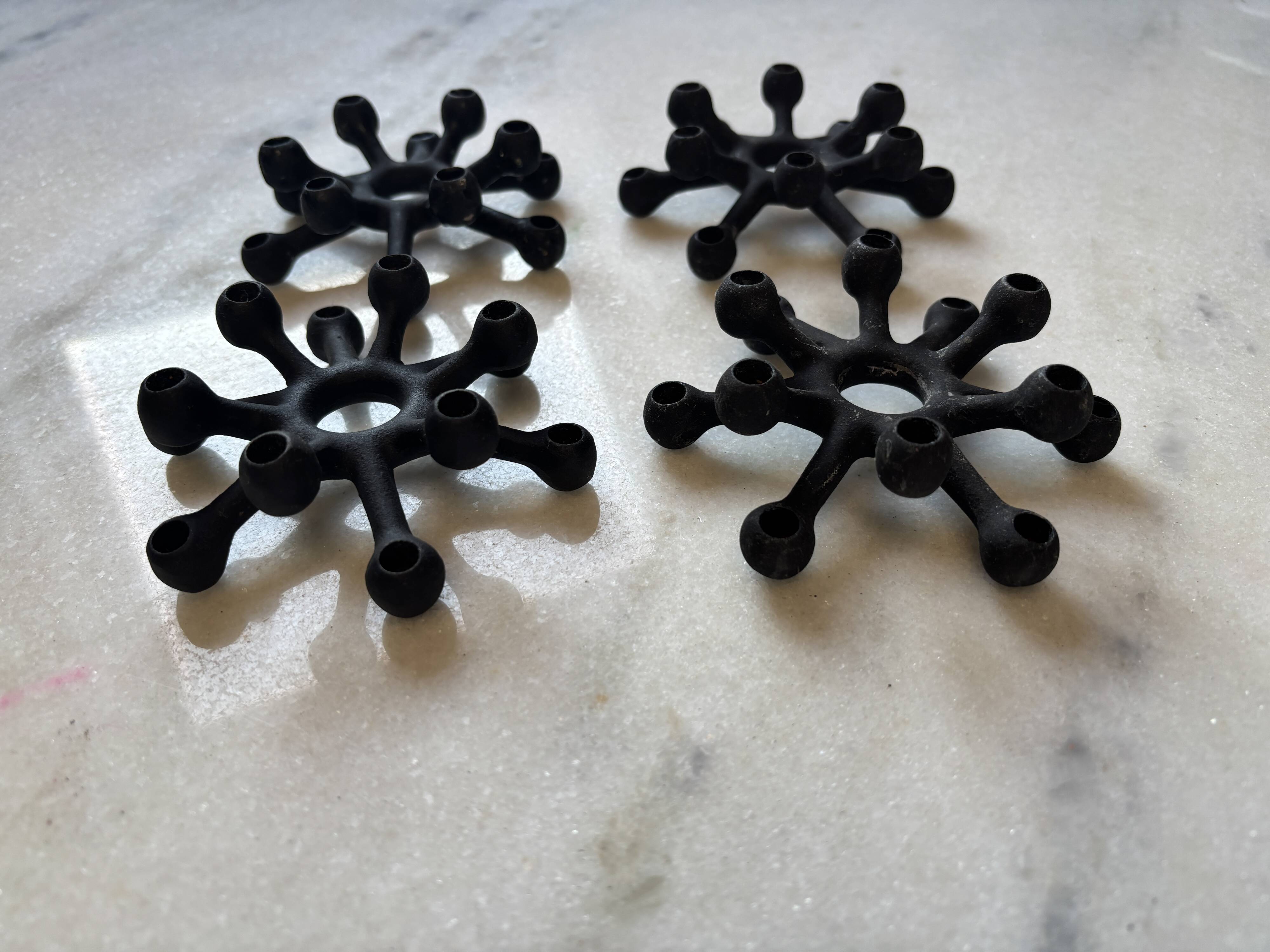 4 "Spider" candle holders by Jens Quistgaard for Dansk Designs, Scandinavian 1960s.