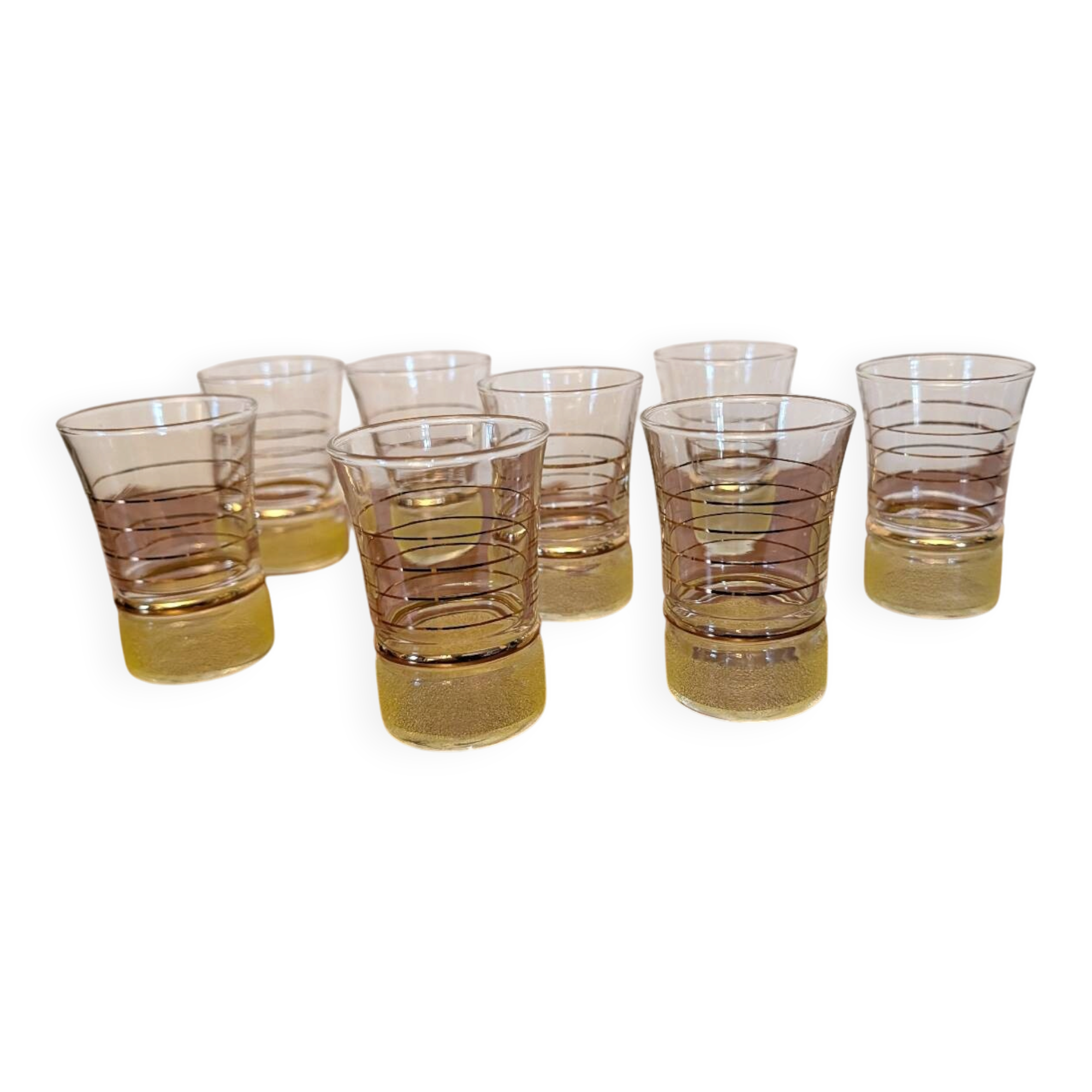 70s vintage glass with gold decoration and a speckled base.