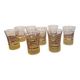 70s vintage glass with gold decoration and a speckled base.