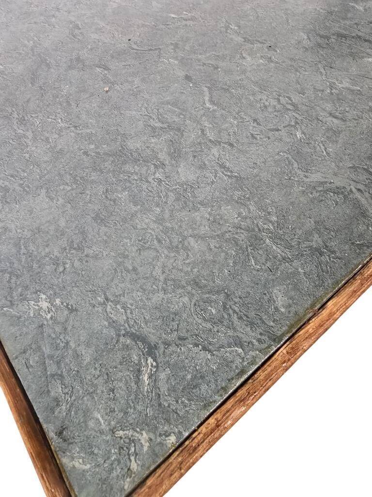 Vintage wooden table with a mint green top.