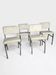 4 chrome metal chairs with faux leather from the 1970s.