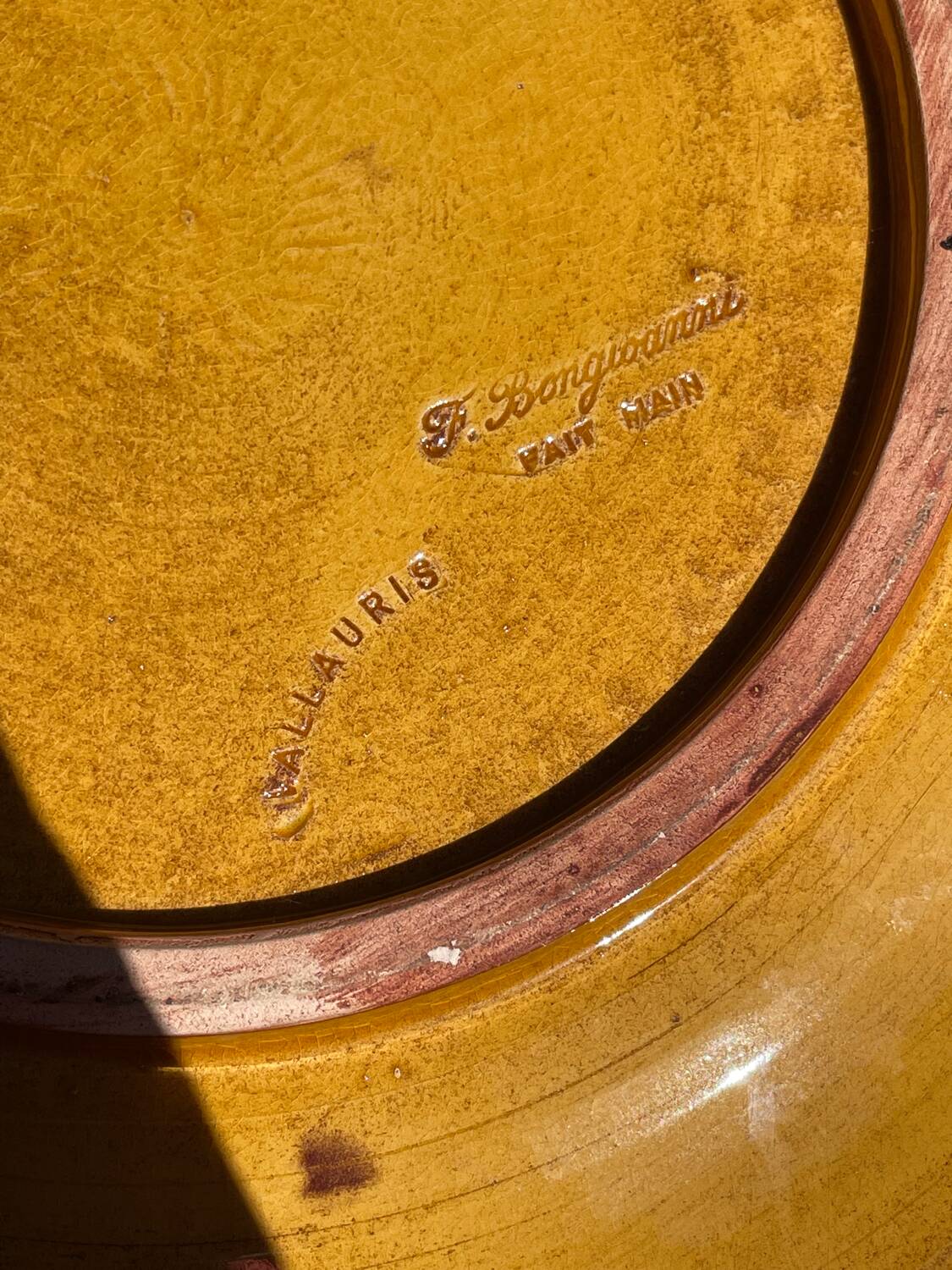 Pair of green glazed stoneware ceramic plates