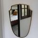 Brass mirror with crest, bead frieze, Italian design style.