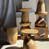 Natural solid mango side table (monoxyle) with conical legs.