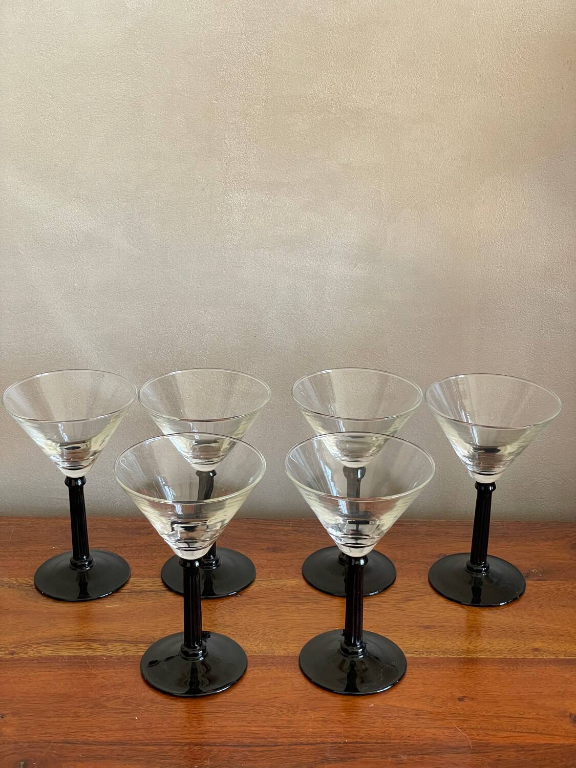 6 black stemmed glasses