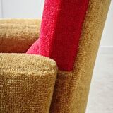 Red and mustard yellow fabric armchair in 1970s style