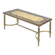Coffee table in gilded brass