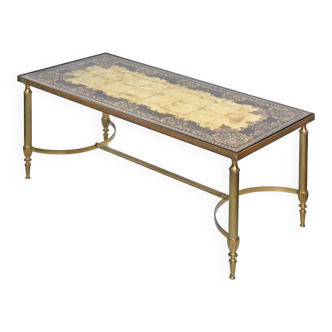 Coffee table in gilded brass