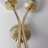 Gold wall light with diamond tips