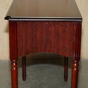 Small console with two drawers in hardwood finish.
