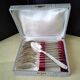 Set of 12 silver-plated coffee spoons in "shell" design.